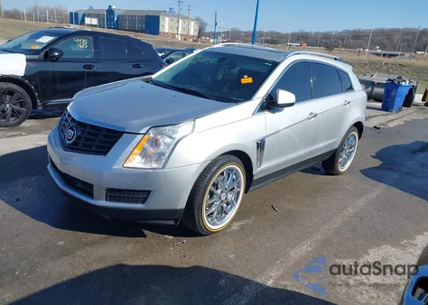 2014 Cadillac Srx Luxury Collection z USA, uszkodzony, nr VIN 3GYFNBE36ES552199